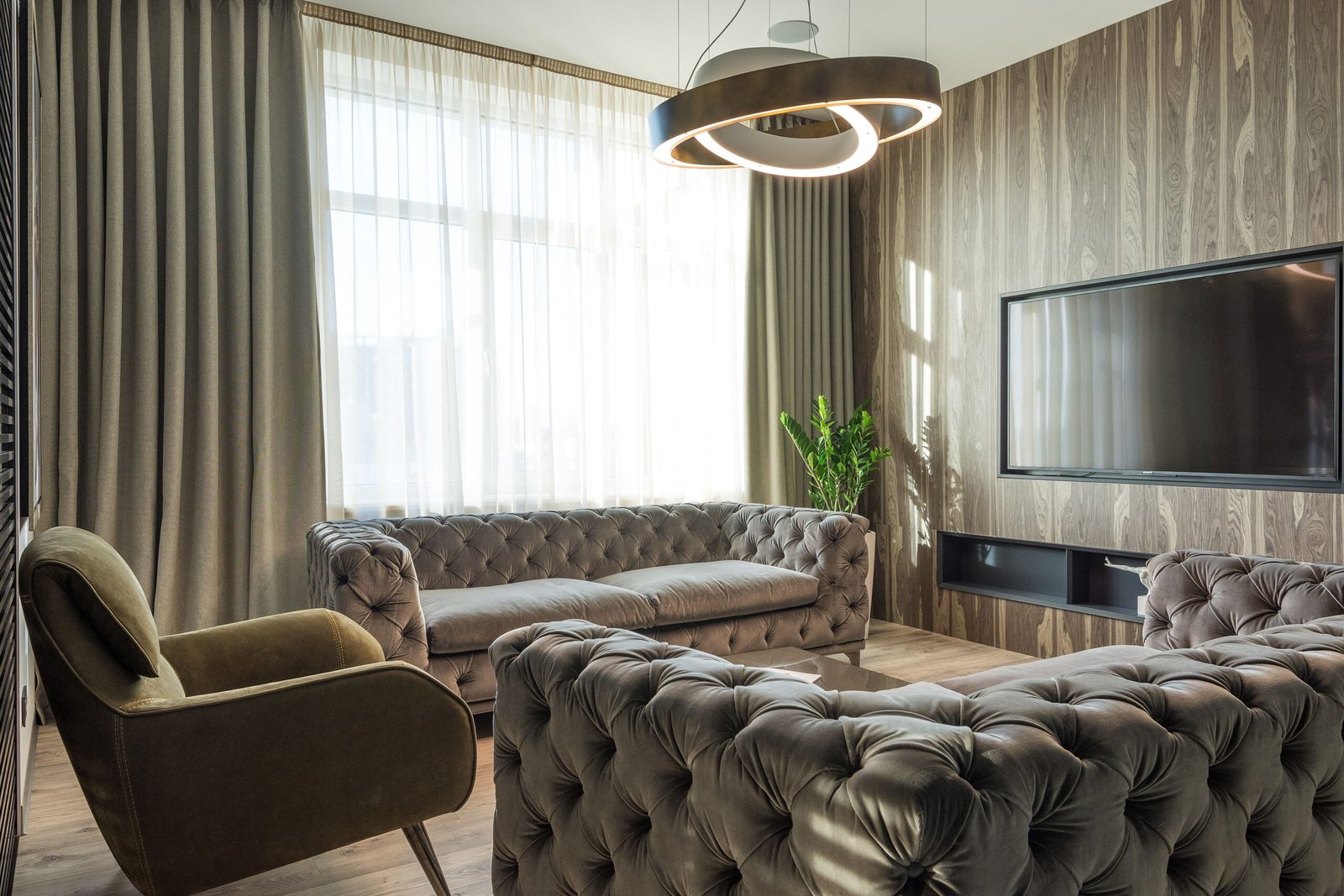 mid century living room set with wood furniture and neutral decor