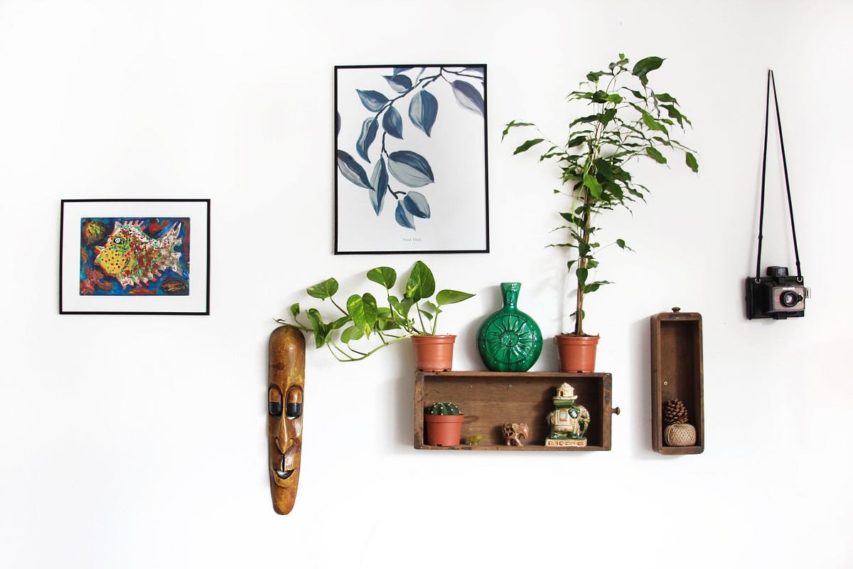 modern artifacts for home decor including sculpture and ceramic vase