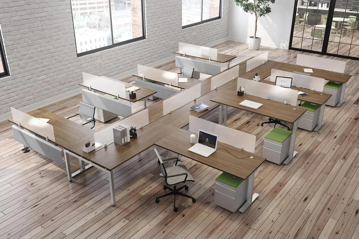 A bright, organized modern office showing a desk, ergonomic chair, storage cabinet, shelves, and clear walking space.
