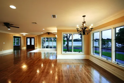professionally decorated modern room with stylish furniture and warm lighting