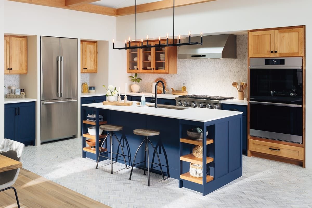 stylish modern kitchen with elegant cabinets, a central island, and organized storage