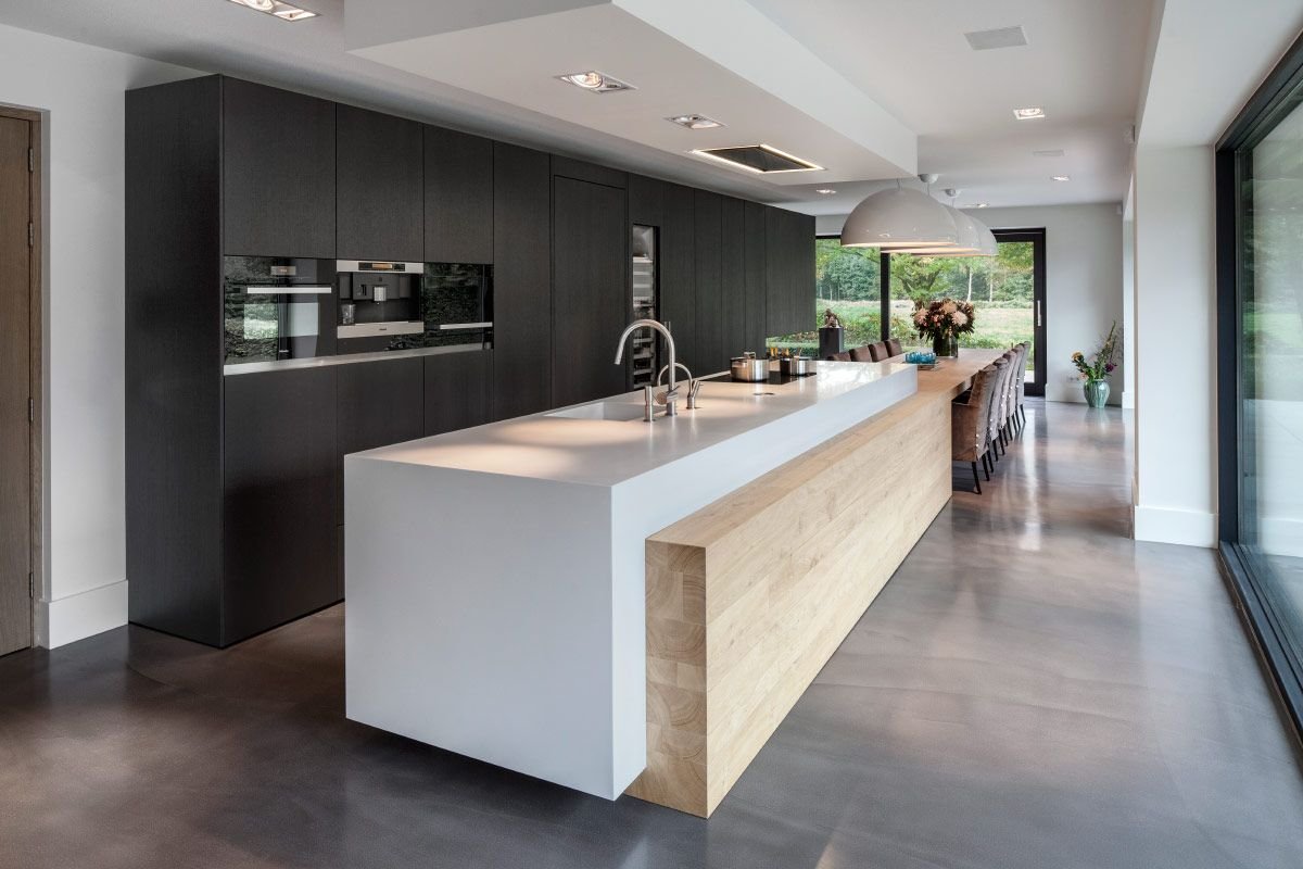 modern kitchen showing different parts including cabinets, countertop, sink and appliances